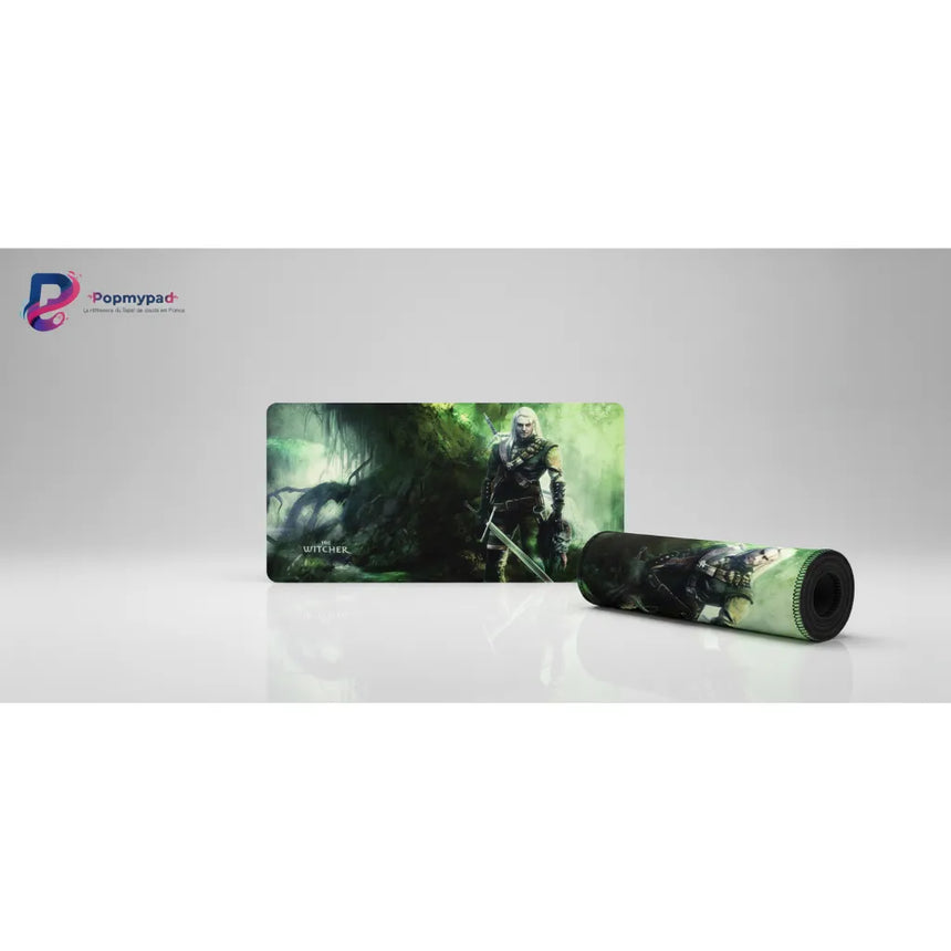 Tapis de Souris Gaming The Witcher - Édition Geralt de Riv Chasseur de Monstres avec illustration de Geralt de Riv.