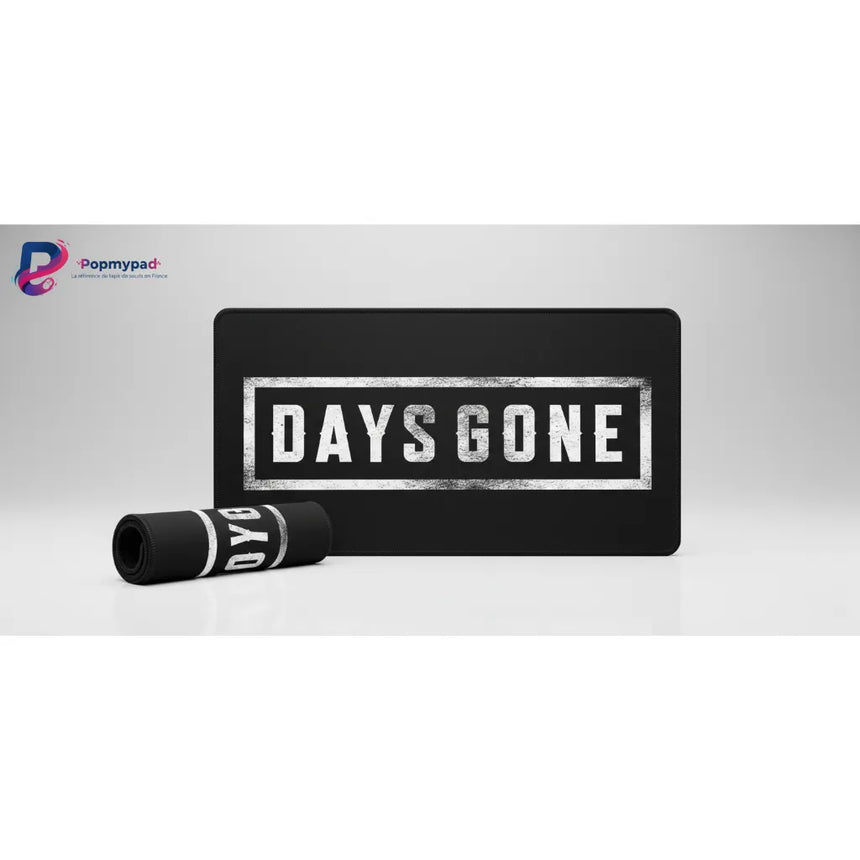 Tapis de souris Gaming Days Gone - Édition "Survivalist" Haute Précision avec design noir et logo blanc.