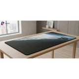 Tapis de souris Star Trek - L'USS Enterprise : L'Odyssée Interstellaire sur un bureau moderne.